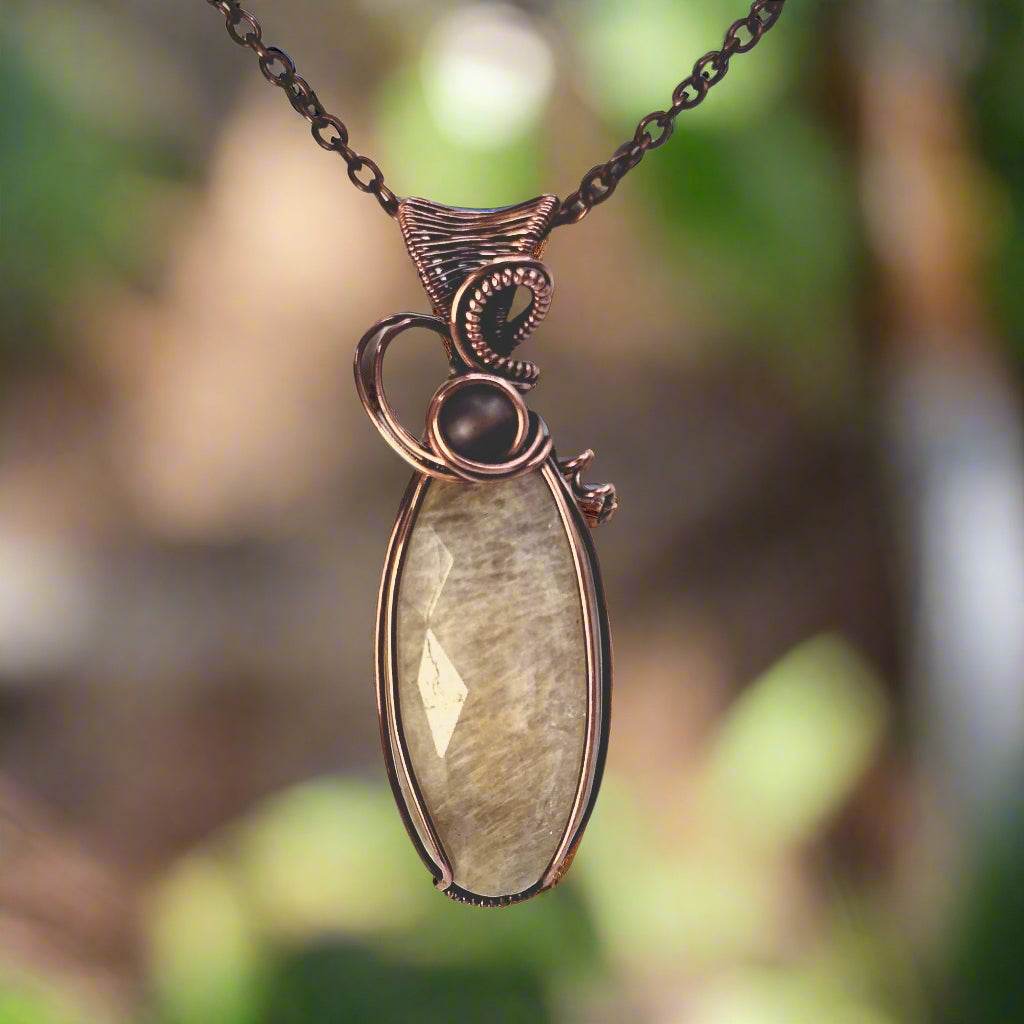 Peach Moonstone in Copper w/ Purple Bead