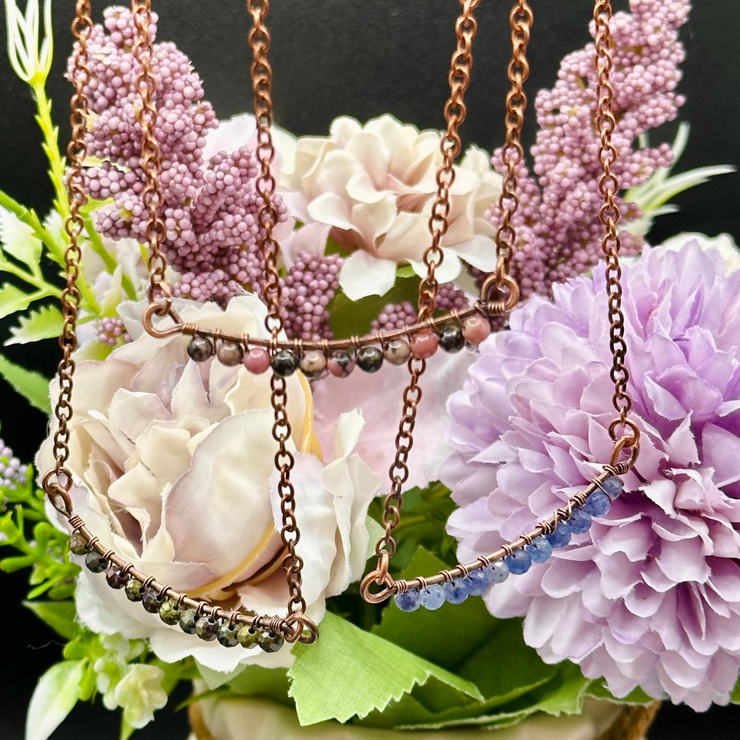 Bar necklace options of rhodonite, dragons blood, and blue aventurine