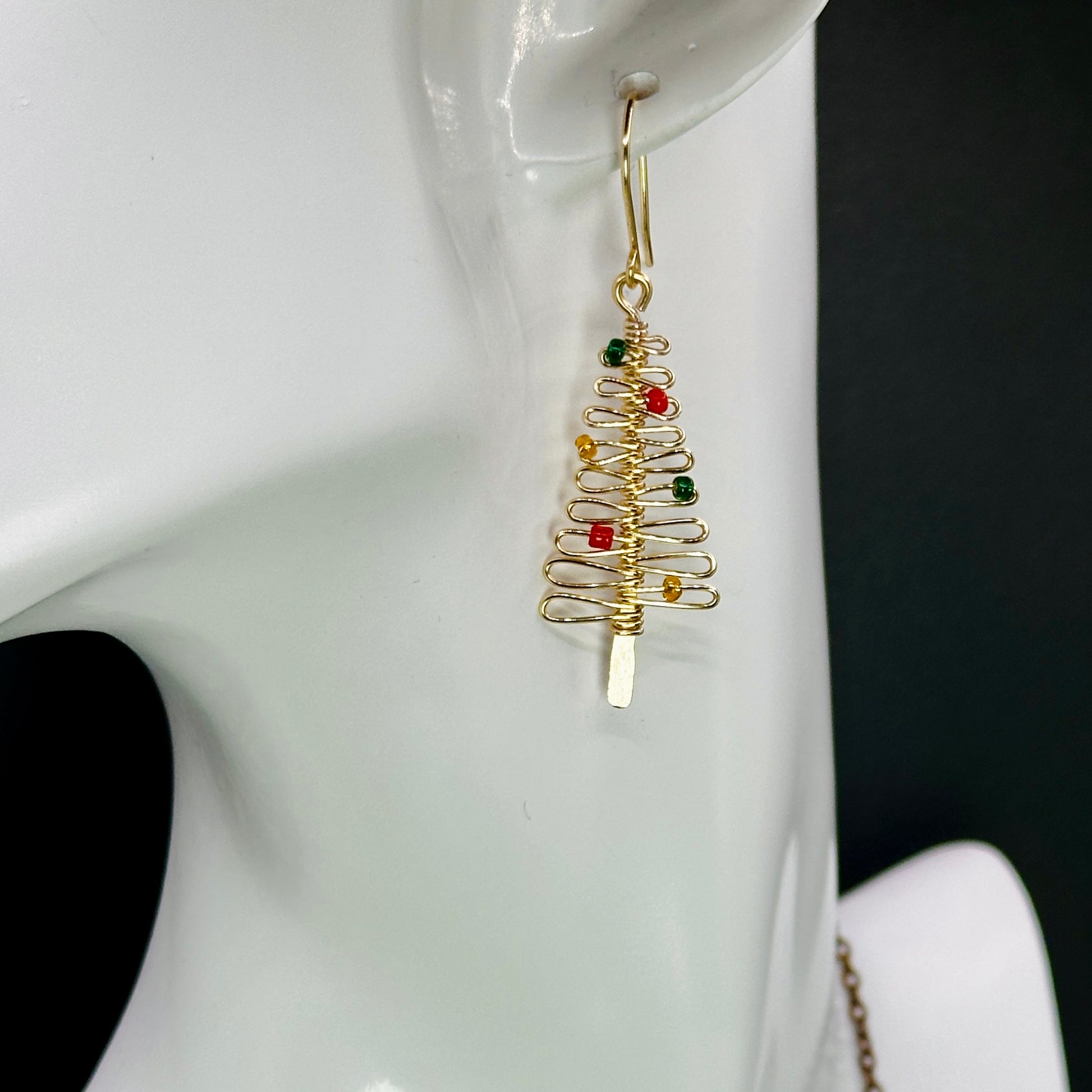 smaller christmas tree earrings in gold