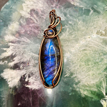 Oval blue labradorite with lab bead