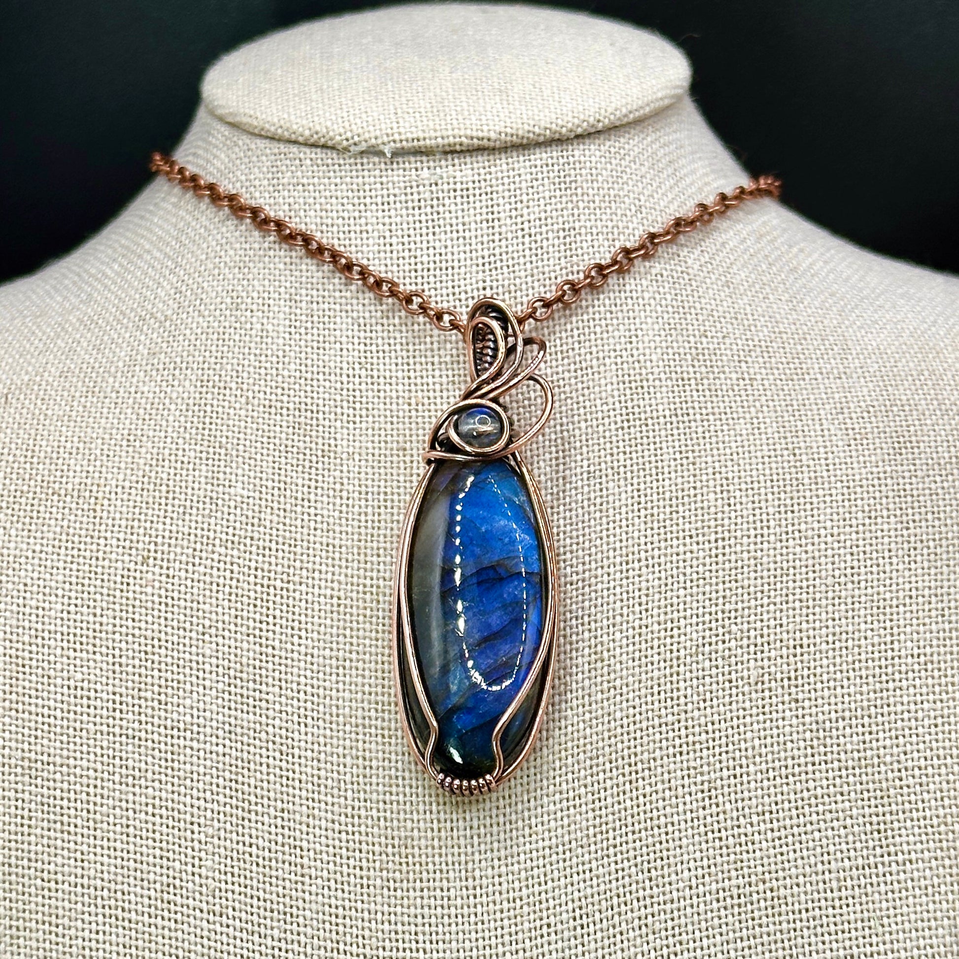 Oval blue labradorite with lab bead