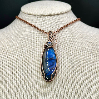Oval blue labradorite with lab bead