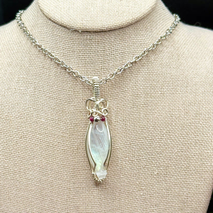 Marquis moonstone with garnet and silver beads and a rose quartz star, wrapped in silver plated copper wire