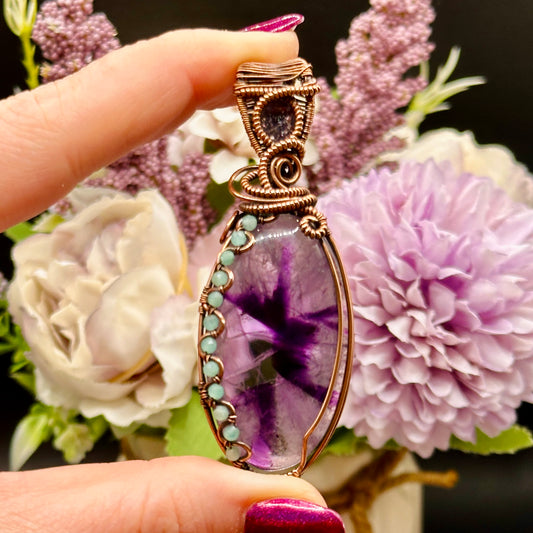 Trapiche Amethyst wrapped in antiqued copper w/ Amazonite beads & an Iolite Sunstone facet