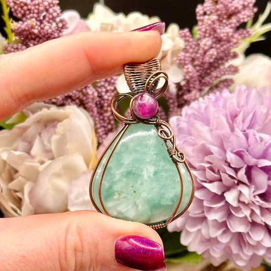 Victoria Stone wrapped in antiqued copper with purple mica bead